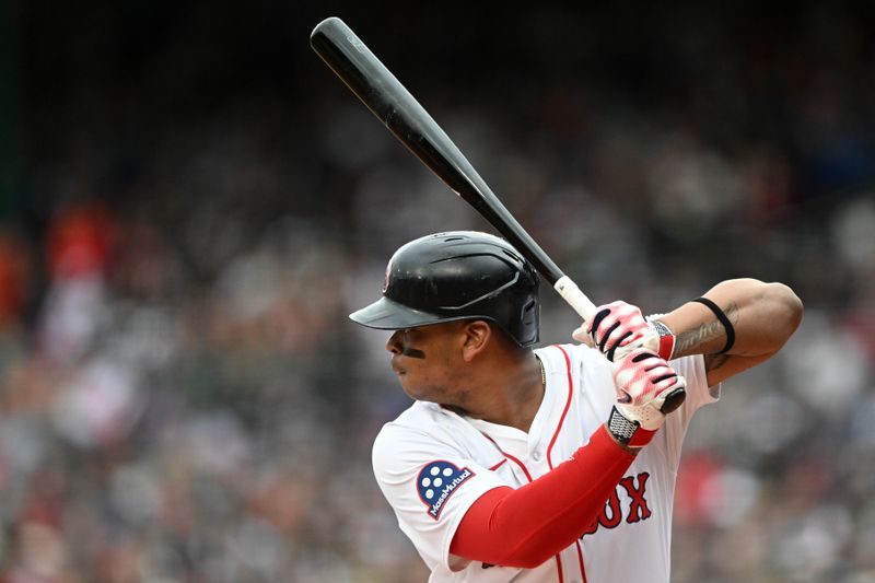 May 25, 2025; Boston, Massachusetts, USA; Boston Red Sox designated hitter Rafael Devers (11) bats against the Baltimore Orioles during the first inning at Fenway Park. Mandatory Credit: Brian Fluharty-Imagn Images