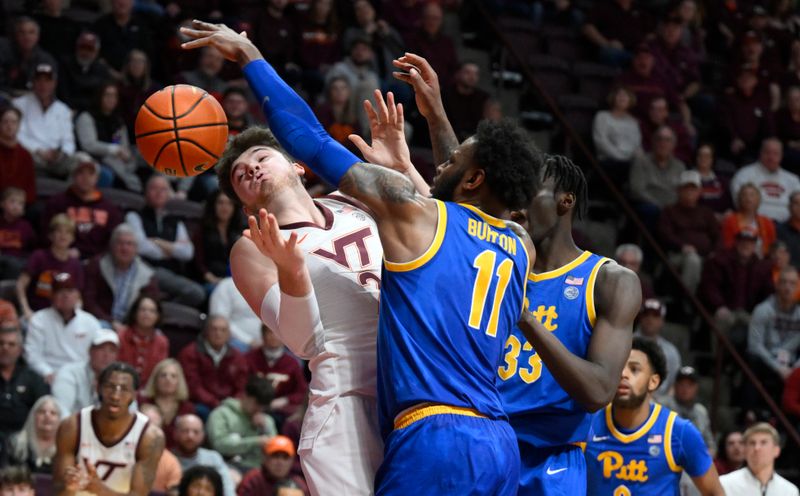 Feb 18, 2023; Blacksburg, Virginia, USA; Virginia Tech Hokies forward Grant Basile (21) and Pittsburgh Panthers guard Jamarius Burton (11) battle for a rebound in the second half at Cassell Coliseum. Mandatory Credit: Lee Luther Jr.-USA TODAY Sports