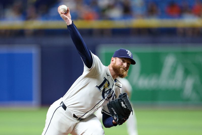 Aug 13, 2024; St. Petersburg, Florida, USA; Tampa Bay Rays pitcher Drew Rasmussen (57) throws a pitch against the Houston Astros in the eighth inning at Tropicana Field. Mandatory Credit: Nathan Ray Seebeck-USA TODAY Sports