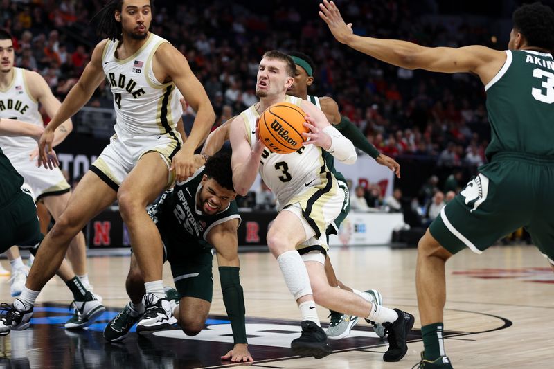 Mar 15, 2024; Minneapolis, MN, USA; Purdue Boilermakers guard Braden Smith (3) drives towards the basket against the Michigan State Spartans during the first half at Target Center. Mandatory Credit: Matt Krohn-USA TODAY Sports