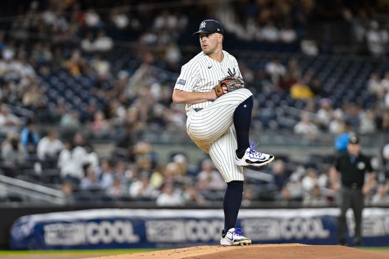 Sep 27, 2024; Bronx, New York, USA; New York Yankees pitcher Carlos Rodon (55) pitches against the Pittsburgh Pirates during the first inning at Yankee Stadium. Mandatory Credit: John Jones-Imagn Images