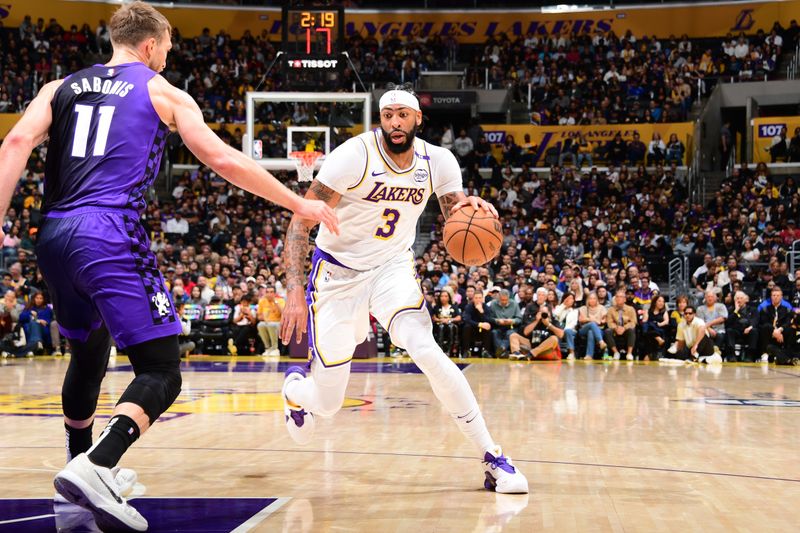 LOS ANGELES, CA - OCTOBER 26: Anthony Davis #3 of the Los Angeles Lakers dribbles the ball during the game against the Sacramento Kings on October 26, 2024 at Crypto.Com Arena in Los Angeles, California. NOTE TO USER: User expressly acknowledges and agrees that, by downloading and/or using this Photograph, user is consenting to the terms and conditions of the Getty Images License Agreement. Mandatory Copyright Notice: Copyright 2024 NBAE (Photo by Adam Pantozzi/NBAE via Getty Images)