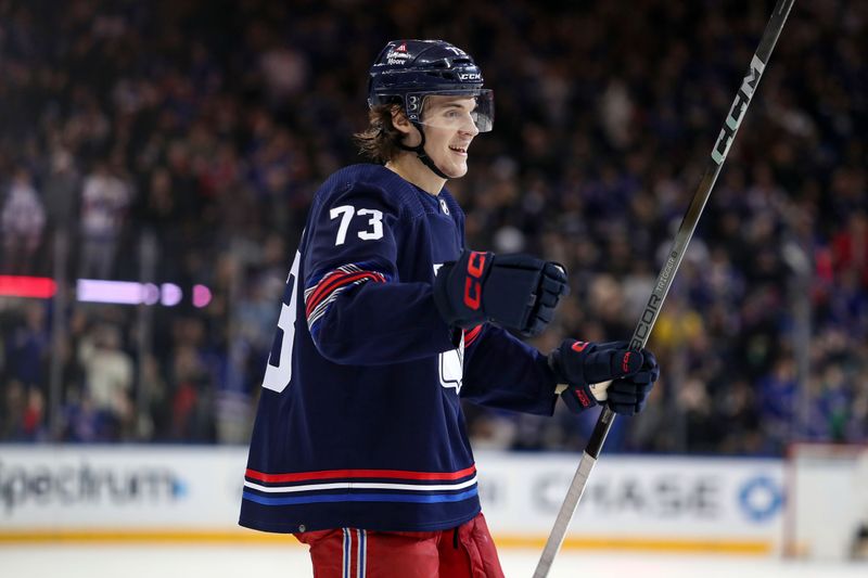 Mar 9, 2024; New York, New York, USA; New York Rangers center Matt Rempe (73) celebrates a goal that was later overturned by replay during the second period against the St. Louis Blues at Madison Square Garden. Mandatory Credit: Danny Wild-USA TODAY Sports