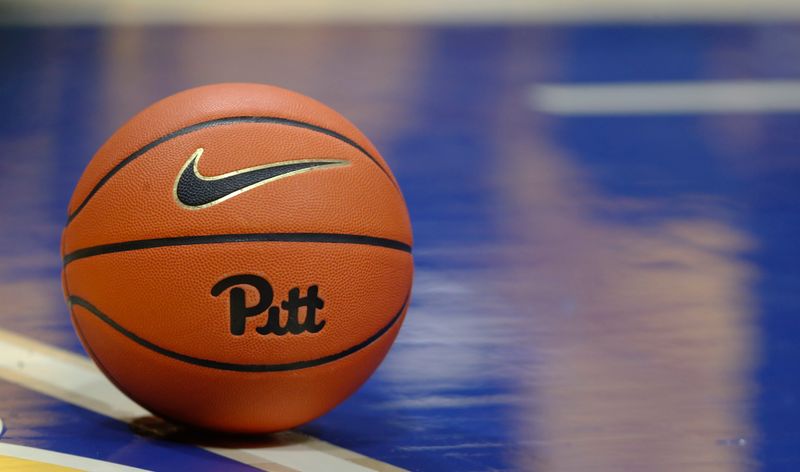 Feb 15, 2025; Pittsburgh, Pennsylvania, USA; A Pittsburgh Panthers basketball sits on the court during a break in the action against the Miami (Fl) Hurricanes in the second half at the Petersen Events Center. Mandatory Credit: Charles LeClaire-Imagn Images