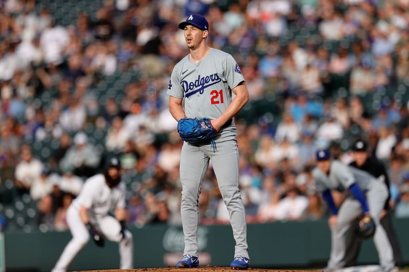 Jun 18, 2024; Denver, Colorado, USA; Los Angeles Dodgers starting pitcher Walker Buehler (21) on the mound in the first inning against the Colorado Rockies at Coors Field. Mandatory Credit: Isaiah J. Downing-USA TODAY Sports