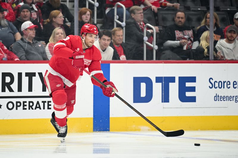 Apr 4, 2025; Detroit, Michigan, USA; Detroit Red Wings defenseman Ben Chart (8) during the first period against the Carolina Hurricanes at Little Caesars Arena. Mandatory Credit: Tim Fuller-Imagn Images