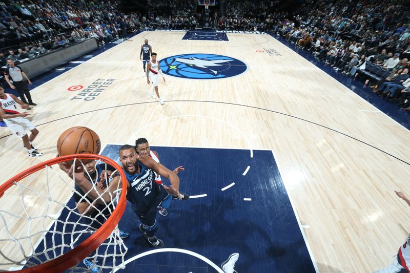 MINNEAPOLIS, MN -  MARCH 4: Rudy Gobert #27 of the Minnesota Timberwolves drives to the basket during the game against the Portland Trail Blazers on March 4, 2024 at Target Center in Minneapolis, Minnesota. NOTE TO USER: User expressly acknowledges and agrees that, by downloading and or using this Photograph, user is consenting to the terms and conditions of the Getty Images License Agreement. Mandatory Copyright Notice: Copyright 2024 NBAE (Photo by David Sherman/NBAE via Getty Images)