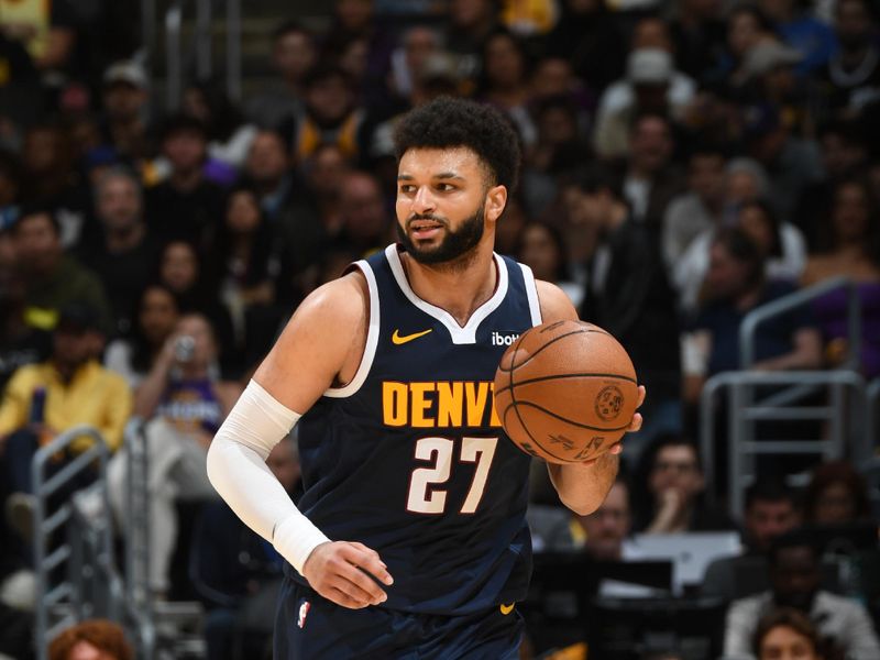 LOS ANGELES, CA - APRIL 27: Jamal Murray #27 of the Denver Nuggets dribbles the ball during the game against the Los Angeles Lakers during Round 1 Game 4 of the 2024 NBA Playoffs on April 27, 2024 at Crypto.Com Arena in Los Angeles, California. NOTE TO USER: User expressly acknowledges and agrees that, by downloading and/or using this Photograph, user is consenting to the terms and conditions of the Getty Images License Agreement. Mandatory Copyright Notice: Copyright 2024 NBAE (Photo by Andrew D. Bernstein/NBAE via Getty Images)