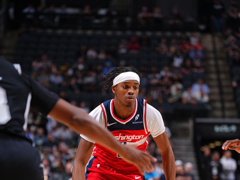 SAN ANTONIO, TX - NOVEMBER 13: Bilal Coulibaly #0 of the Washington Wizards dribbles the ball during the game against the San Antonio Spurs on November 13, 2024 at the Frost Bank Center in San Antonio, Texas. NOTE TO USER: User expressly acknowledges and agrees that, by downloading and or using this photograph, user is consenting to the terms and conditions of the Getty Images License Agreement. Mandatory Copyright Notice: Copyright 2024 NBAE (Photos byGarrett Ellwood/NBAE via Getty Images)