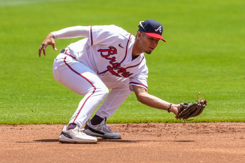 Apr 23, 2023; Cumberland, Georgia, USA; Atlanta Braves shortstop Vaughn Grissom (18) catches a line drive hit by Houston Astros third baseman Alex Bregman (2) (not shown) during the first inning at Truist Park. Mandatory Credit: Dale Zanine-USA TODAY Sports