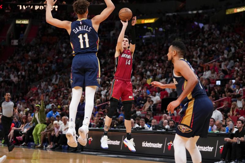 MIAMI, FLORIDA - JANUARY 22: Tyler Herro #14 of the Miami Heat attempts a three-point shot during the second half against the New Orleans Pelicans at Miami-Dade Arena on January 22, 2023 in Miami, Florida. NOTE TO USER: User expressly acknowledges and agrees that,? by downloading and or using this photograph,? User is consenting to the terms and conditions of the Getty Images License Agreement. (Photo by Eric Espada/Getty Images)