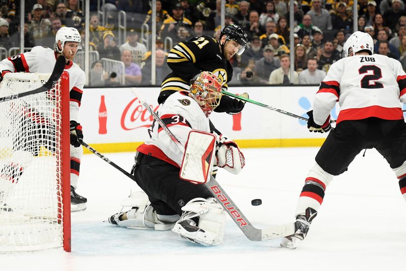 Apr 16, 2024; Boston, Massachusetts, USA;  Ottawa Senators goaltender Anton Forsberg (31) makes a save in front of Boston Bruins left wing James van Riemsdyk (21) and defenseman Artem Zub (2) during the third period at TD Garden. Mandatory Credit: Bob DeChiara-USA TODAY Sports