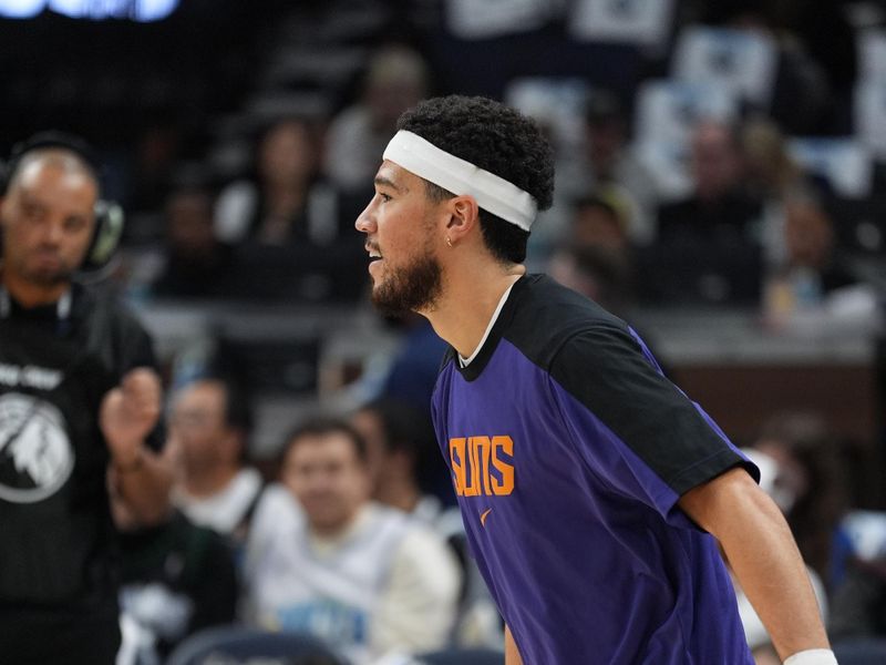 MINNEAPOLIS, MN -  NOVEMBER 17: Devin Booker #1 of the Phoenix Suns smiles before the game against the Minnesota Timberwolves on November 17, 2024 at Target Center in Minneapolis, Minnesota. NOTE TO USER: User expressly acknowledges and agrees that, by downloading and or using this Photograph, user is consenting to the terms and conditions of the Getty Images License Agreement. Mandatory Copyright Notice: Copyright 2024 NBAE (Photo by Jordan Johnson/NBAE via Getty Images)