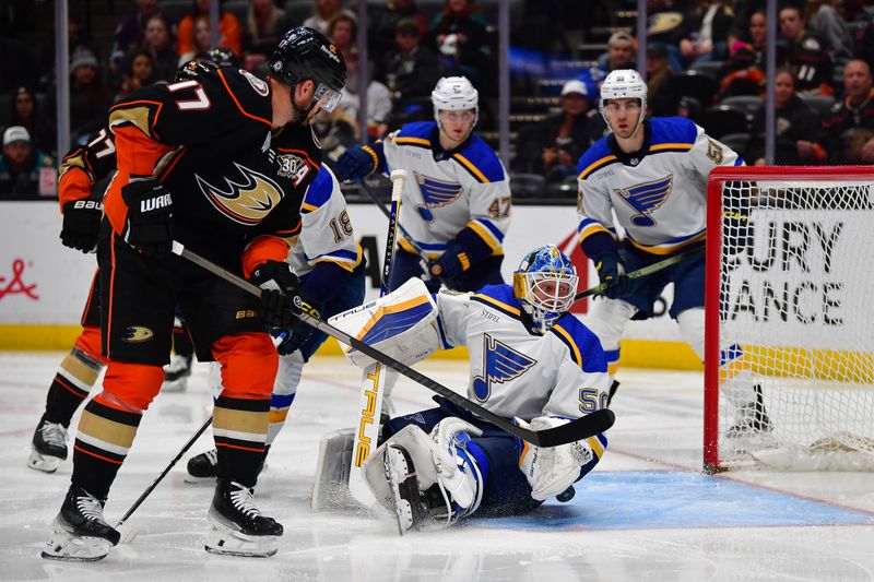 Apr 7, 2024; Anaheim, California, USA; St. Louis Blues goaltender Jordan Binnington (50) allows a goal scored by Anaheim Ducks right wing Frank Vatrano (77) during the second period at Honda Center. Mandatory Credit: Gary A. Vasquez-USA TODAY Sports