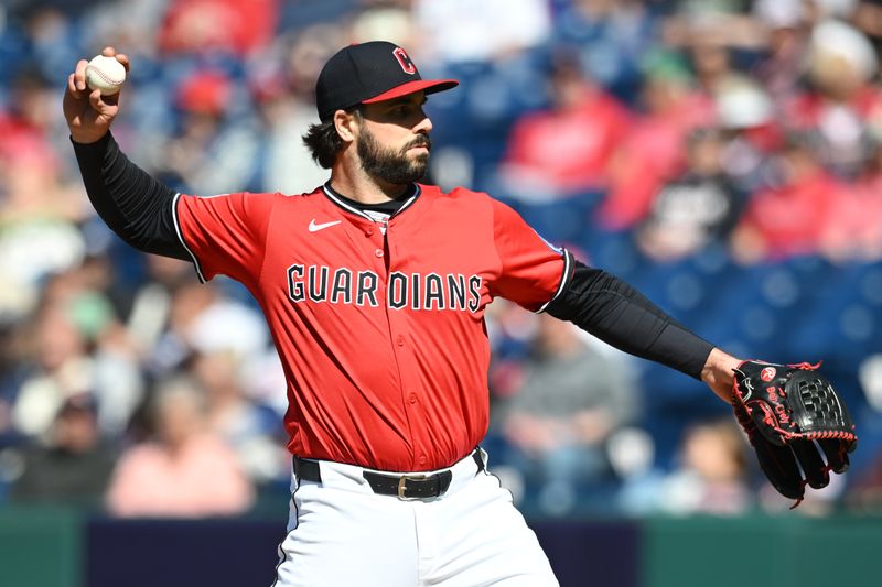 Apr 27, 2025; Cleveland, Ohio, USA; Cleveland Guardians catcher Austin Hedges (27) throws a pitch during the ninth inning against the Boston Red Sox at Progressive Field. Mandatory Credit: Ken Blaze-Imagn Images