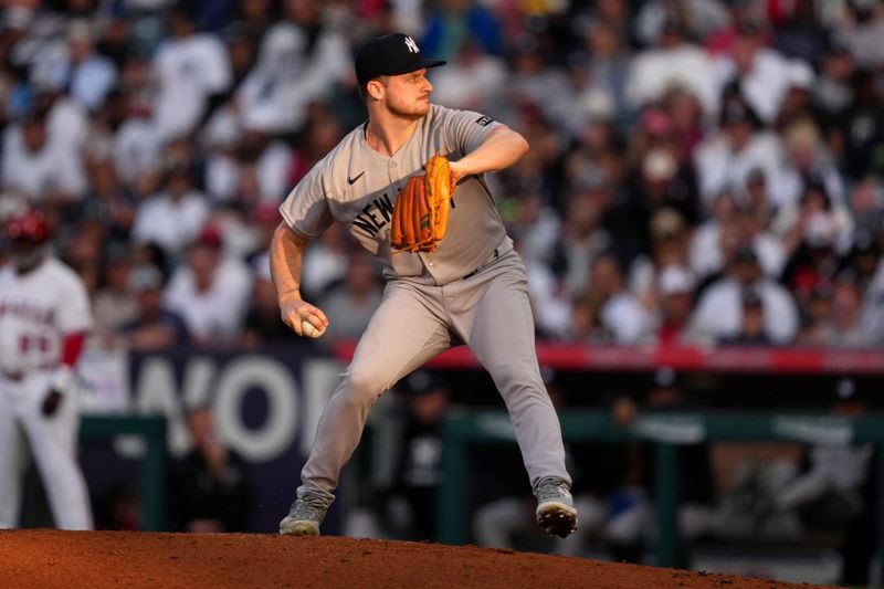 May 28, 2025; Anaheim, California, USA; New York Yankees starting pitcher Clarke Schmidt (36) throws in the first inning against the Los Angeles Angels at Angel Stadium. Mandatory Credit: Kirby Lee-Imagn Images