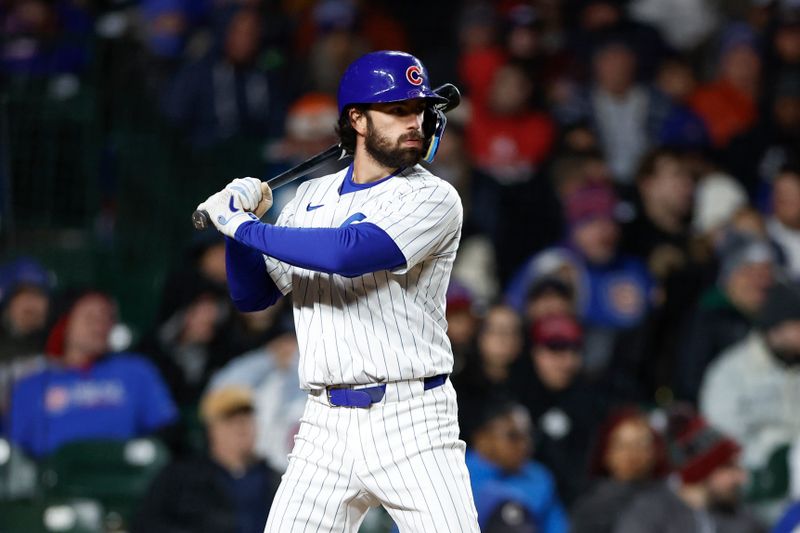 Apr 24, 2024; Chicago, Illinois, USA; Chicago Cubs shortstop Dansby Swanson (7) bats against the Houston Astros during the fifth inning at Wrigley Field. Mandatory Credit: Kamil Krzaczynski-USA TODAY Sports