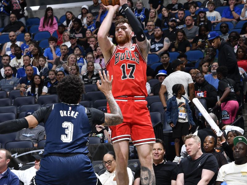 ORLANDO, FL - APRIL 7: Onuralp Bitim #17 of the Chicago Bulls shoots a three point basket against the Orlando Magic on April 7, 2024 at the Kia Center in Orlando, Florida. NOTE TO USER: User expressly acknowledges and agrees that, by downloading and or using this photograph, User is consenting to the terms and conditions of the Getty Images License Agreement. Mandatory Copyright Notice: Copyright 2024 NBAE (Photo by Gary Bassing/NBAE via Getty Images)