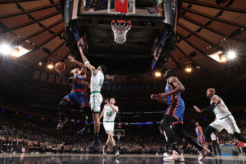 NEW YORK, NY - FEBRUARY 24: Josh Hart #3 of the New York Knicks drives to the basket during the game against the Boston Celtics on February 24, 2024 at Madison Square Garden in New York City, New York.  NOTE TO USER: User expressly acknowledges and agrees that, by downloading and or using this photograph, User is consenting to the terms and conditions of the Getty Images License Agreement. Mandatory Copyright Notice: Copyright 2024 NBAE  (Photo by Nathaniel S. Butler/NBAE via Getty Images)