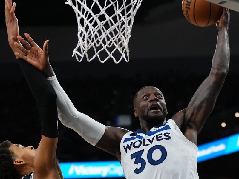 SAN ANTONIO, TX - NOVEMBER 2: Julius Randle #30 of the Minnesota Timberwolves drives to the basket during the game against the San Antonio Spurs on November 2, 2024 at the Frost Bank Center in San Antonio, Texas. NOTE TO USER: User expressly acknowledges and agrees that, by downloading and or using this photograph, user is consenting to the terms and conditions of the Getty Images License Agreement. Mandatory Copyright Notice: Copyright 2024 NBAE (Photos by Cooper Neill/NBAE via Getty Images)