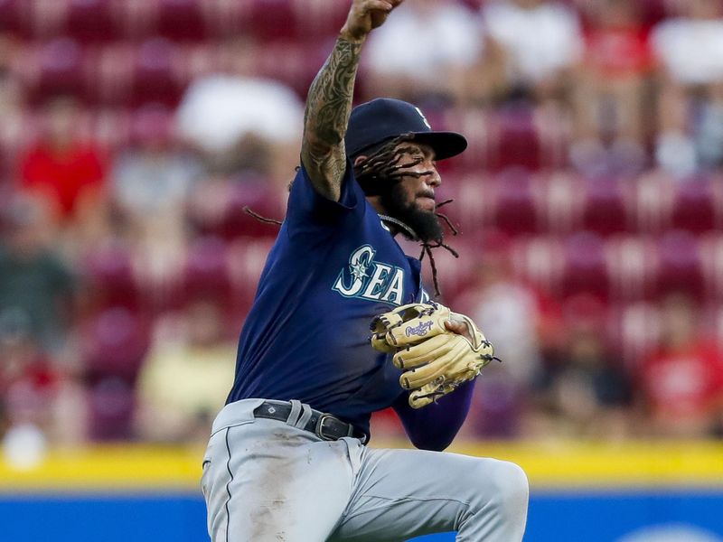 Sep 5, 2023; Cincinnati, Ohio, USA; Seattle Mariners shortstop J.P. Crawford (3) throws to first in attempt to get Cincinnati Reds third baseman Noelvi Marte (not pictured) out in the third inning at Great American Ball Park. Mandatory Credit: Katie Stratman-USA TODAY Sports