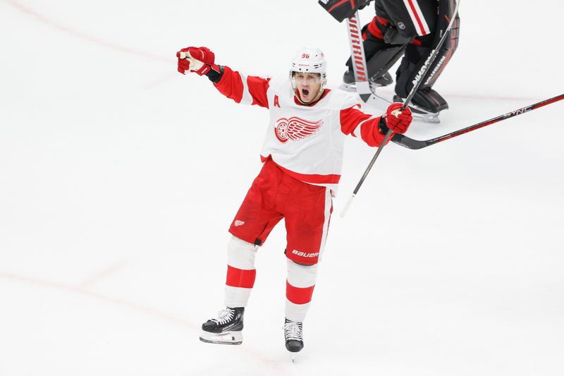 Feb 25, 2024; Chicago, Illinois, USA; Detroit Red Wings right wing Patrick Kane (88) celebrates after scoring game winning goal against the Chicago Blackhawks in overtime at United Center. Mandatory Credit: Kamil Krzaczynski-USA TODAY Sports