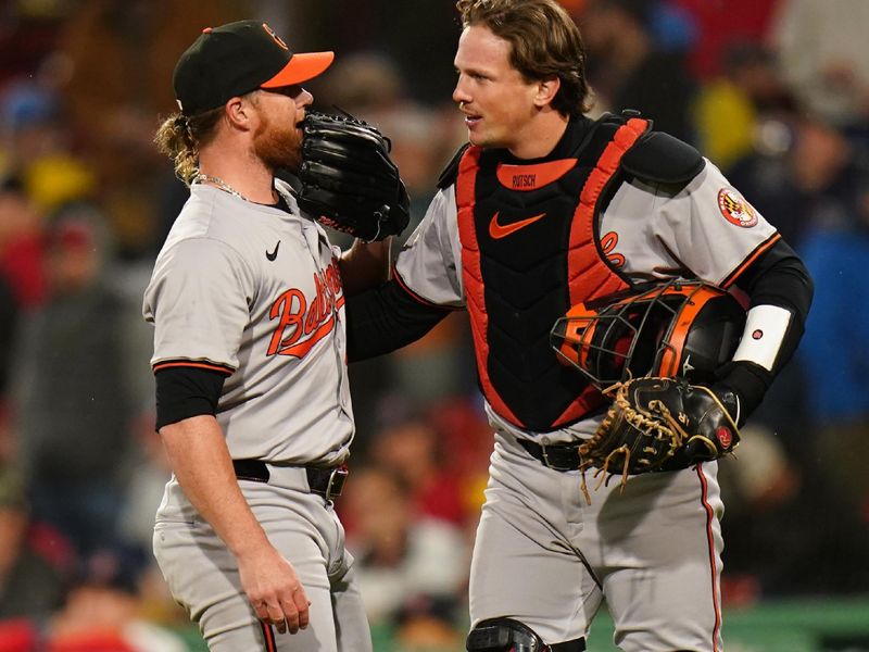 Apr 10, 2024; Boston, Massachusetts, USA; Baltimore Orioles catcher Adley Rutschman (35) and pitcher Craig Kimbrel (46) react after defeating the Boston Red Sox in nine innings at Fenway Park. Mandatory Credit: David Butler II-USA TODAY Sports