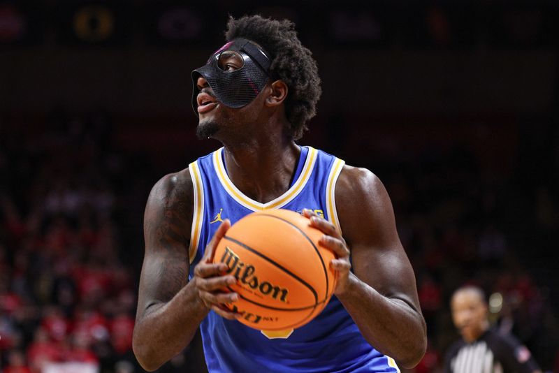 Jan 13, 2025; Piscataway, New Jersey, USA; UCLA Bruins guard Eric Dailey Jr. (3) goes to the basket during the first half against the Rutgers Scarlet Knights at Jersey Mike's Arena. Mandatory Credit: Vincent Carchietta-Imagn Images