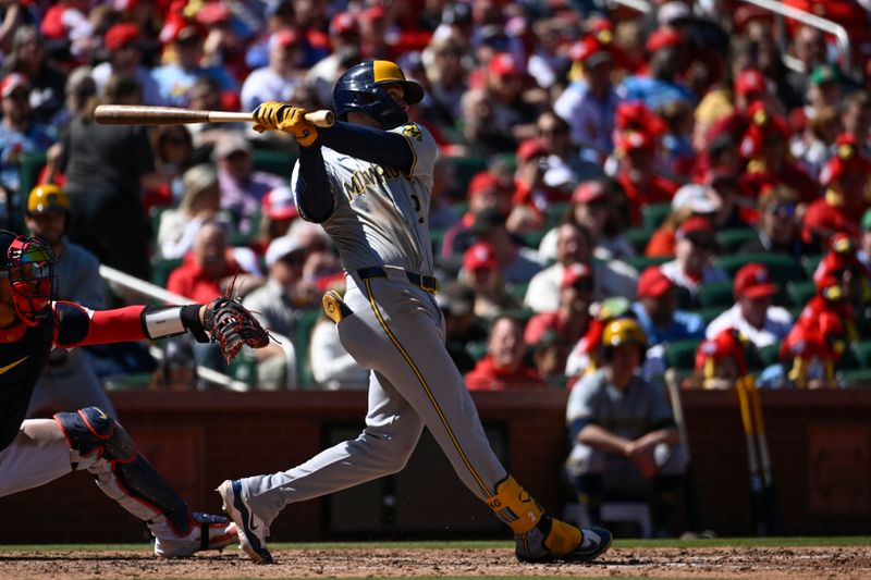 Apr 21, 2024; St. Louis, Missouri, USA; Milwaukee Brewers second baseman Brice Turang (2) hits a single against the St. Louis Cardinals in the seventh inning at Busch Stadium. Mandatory Credit: Joe Puetz-USA TODAY Sports