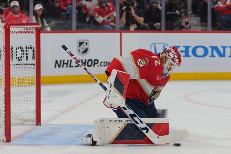 Jan 16, 2025; Sunrise, Florida, USA; Florida Panthers goaltender Sergei Bobrovsky (72) makes a save against the Detroit Red Wings during the first period at Amerant Bank Arena. Mandatory Credit: Sam Navarro-Imagn Images
