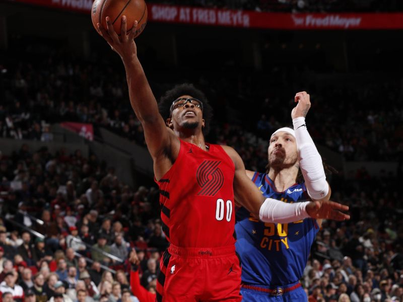 PORTLAND, OR - MARCH 23: Scoot Henderson #00 of the Portland Trail Blazers drives to the basket during the game against the Denver Nuggets on March 23, 2024 at the Moda Center Arena in Portland, Oregon. NOTE TO USER: User expressly acknowledges and agrees that, by downloading and or using this photograph, user is consenting to the terms and conditions of the Getty Images License Agreement. Mandatory Copyright Notice: Copyright 2024 NBAE (Photo by Cameron Browne/NBAE via Getty Images)