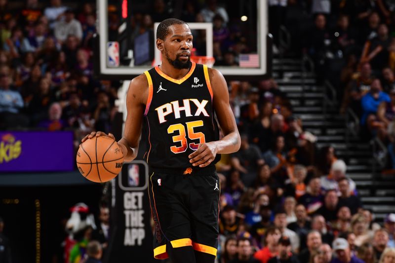 PHOENIX, AZ - APRIL  3: Kevin Durant #35 of the Phoenix Suns dribbles the ball during the game against the Cleveland Cavaliers on April 3, 2024 at Footprint Center in Phoenix, Arizona. NOTE TO USER: User expressly acknowledges and agrees that, by downloading and or using this photograph, user is consenting to the terms and conditions of the Getty Images License Agreement. Mandatory Copyright Notice: Copyright 2024 NBAE (Photo by Kate Frese/NBAE via Getty Images)