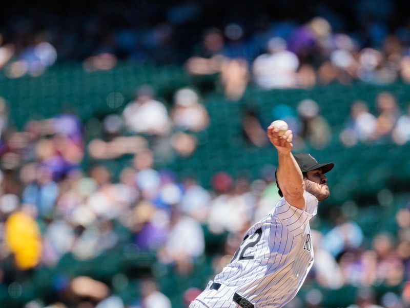 Jun 5, 2024; Denver, Colorado, USA; Colorado Rockies starting pitcher Dakota Hudson (32) delivers a pitch against the Cincinnati Reds during the third inning at Coors Field. Mandatory Credit: Andrew Wevers-USA TODAY Sports