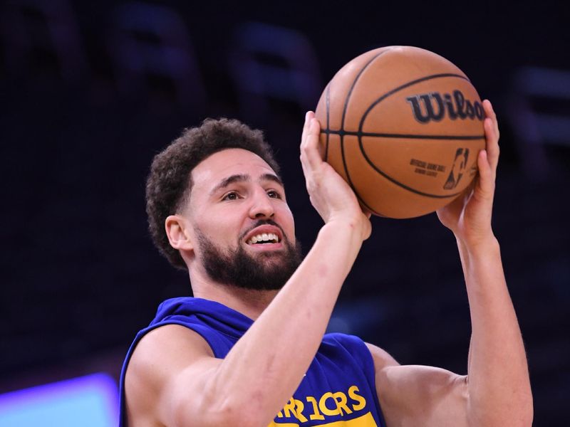 SAN FRANCISCO, CA - DECEMBER 3: Klay Thompson #11 of the Golden State Warriors smiles during warm ups before the game against the Houston Rockets on December 3, 2022 at Chase Center in San Francisco, California. NOTE TO USER: User expressly acknowledges and agrees that, by downloading and or using this photograph, user is consenting to the terms and conditions of Getty Images License Agreement. Mandatory Copyright Notice: Copyright 2022 NBAE (Photo by Noah Graham/NBAE via Getty Images)