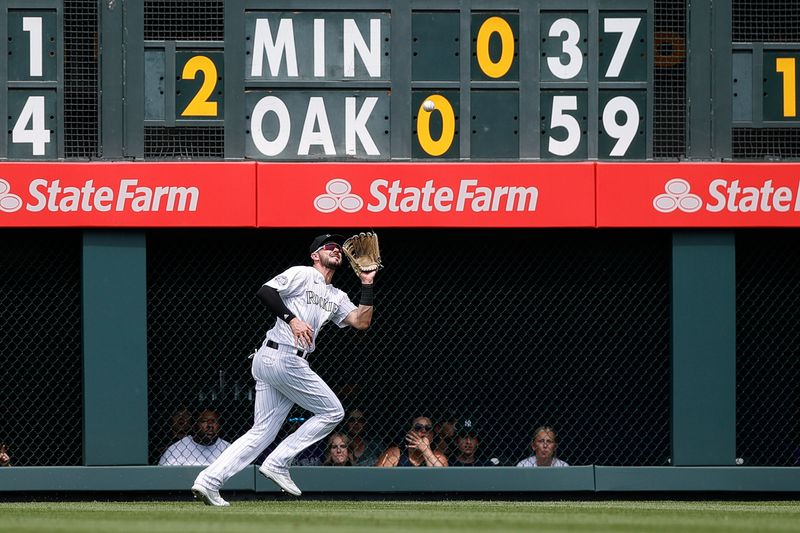 Jul 16, 2023; Denver, Colorado, USA; Colorado Rockies right fielder Kris Bryant (23) makes a catch in the fifth inning against the New York Yankees at Coors Field. Mandatory Credit: Isaiah J. Downing-USA TODAY Sports