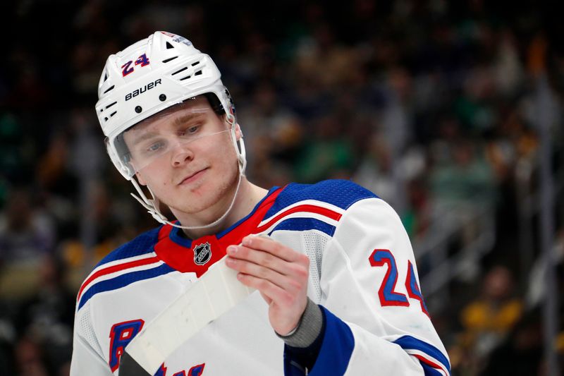 Mar 16, 2024; Pittsburgh, Pennsylvania, USA;  New York Rangers right wing Kaapo Kakko (24) checks his stick tape  against the Pittsburgh Penguins during the second period at PPG Paints Arena. Mandatory Credit: Charles LeClaire-USA TODAY Sports