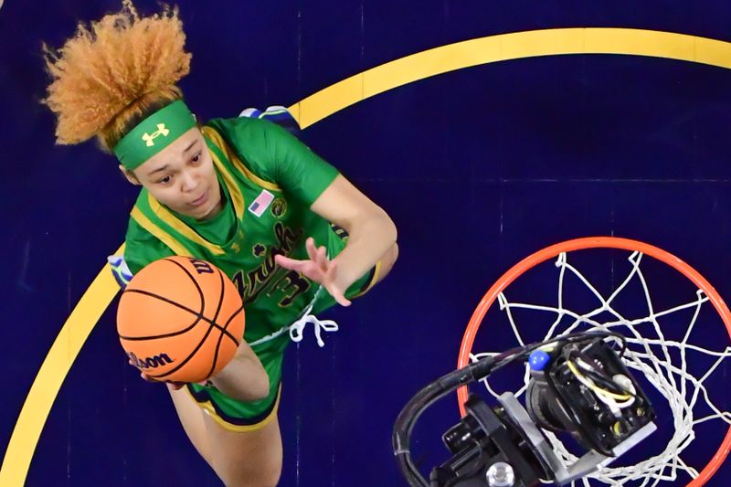 Feb 29, 2024; South Bend, Indiana, USA; Notre Dame Fighting Irish guard Hannah Hidalgo (3) goes up for a shot in the first half against the Virginia Tech Hokies at the Purcell Pavilion. Mandatory Credit: Matt Cashore-USA TODAY Sports