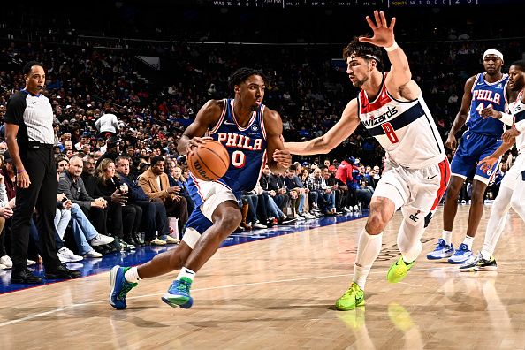 PHILADELPHIA, PA - DECEMBER 11: Tyrese Maxey #0 of the Philadelphia 76ers dribbles the ball during the game against the Washington Wizards on December 11, 2023 at the Wells Fargo Center in Philadelphia, Pennsylvania NOTE TO USER: User expressly acknowledges and agrees that, by downloading and/or using this Photograph, user is consenting to the terms and conditions of the Getty Images License Agreement. Mandatory Copyright Notice: Copyright 2023 NBAE (Photo by David Dow/NBAE via Getty Images)