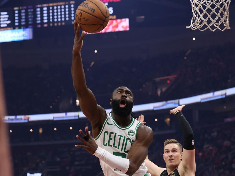 CLEVELAND, OH - MARCH 5: Jaylen Brown #7 of the Boston Celtics drives to the basket during the game against the Cleveland Cavaliers on March 5, 2024 at Rocket Mortgage FieldHouse in Cleveland, Ohio. NOTE TO USER: User expressly acknowledges and agrees that, by downloading and/or using this Photograph, user is consenting to the terms and conditions of the Getty Images License Agreement. Mandatory Copyright Notice: Copyright 2024 NBAE (Photo by Lauren Leigh Bacho<p><br/></p>/NBAE via Getty Images)