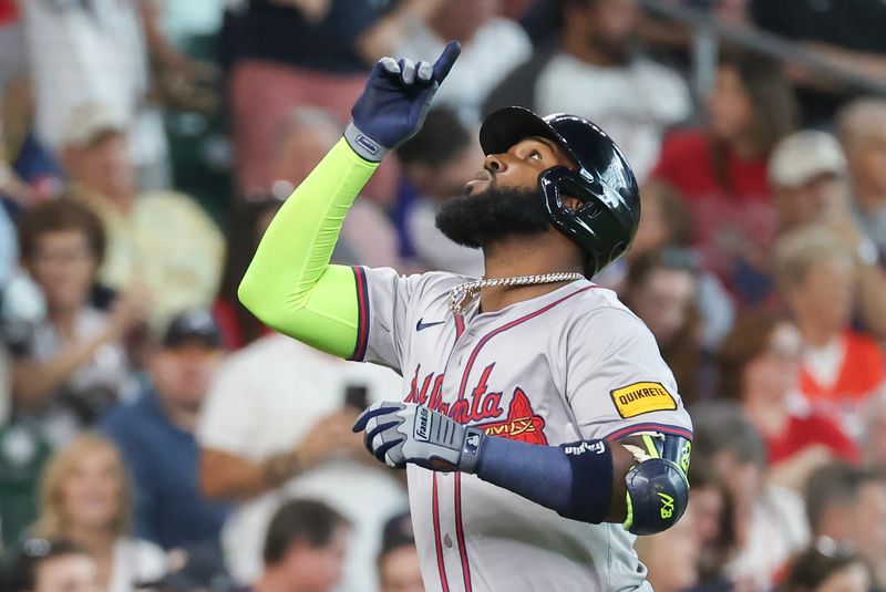 Apr 17, 2024; Houston, Texas, USA; Atlanta Braves designated hitter Marcell Ozuna (20) celebrates his home run against the Houston Astros in the second inning at Minute Maid Park. Mandatory Credit: Thomas Shea-USA TODAY Sports