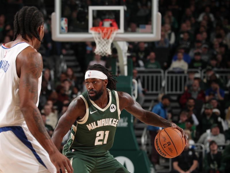 MILWAUKEE, WI - MARCH 4: Patrick Beverley #21 of the Milwaukee Bucks dribbles the ball during the game against the LA Clippers on March 4, 2024 at the Fiserv Forum Center in Milwaukee, Wisconsin. NOTE TO USER: User expressly acknowledges and agrees that, by downloading and or using this Photograph, user is consenting to the terms and conditions of the Getty Images License Agreement. Mandatory Copyright Notice: Copyright 2024 NBAE (Photo by Gary Dineen/NBAE via Getty Images).