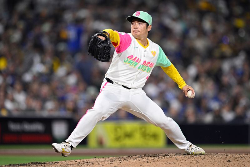 May 10, 2024; San Diego, California, USA; San Diego Padres relief pitcher Yuki Matsui (1) throws a pitch against the Los Angeles Dodgers during the eighth inning at Petco Park. Mandatory Credit: Orlando Ramirez-USA TODAY Sports