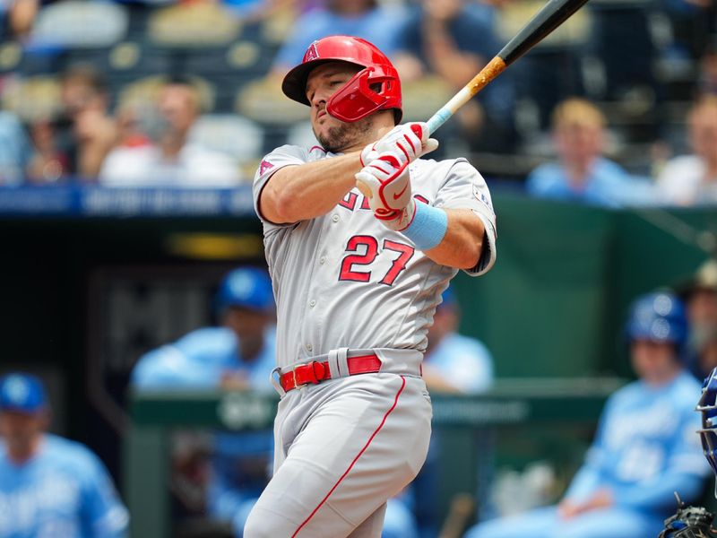 Jun 18, 2023; Kansas City, Missouri, USA; Los Angeles Angels center fielder Mike Trout (27) hits a double during the second inning against the Kansas City Royals at Kauffman Stadium. Mandatory Credit: Jay Biggerstaff-USA TODAY Sports