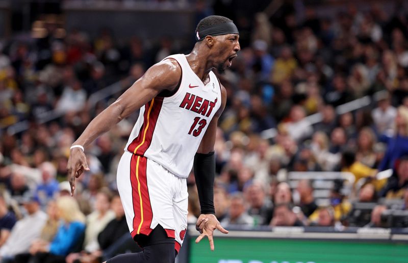 INDIANAPOLIS, INDIANA - NOVEMBER 15: Bam Adebayo #13 of the Miami Heat celebrates after making a three point shot against the Indiana Pacers at Gainbridge Fieldhouse on November 15, 2024 in Indianapolis, Indiana.  NOTE TO USER: User expressly acknowledges and agrees that, by downloading and or using this photograph, User is consenting to the terms and conditions of the Getty Images License Agreement. (Photo by Andy Lyons/Getty Images)