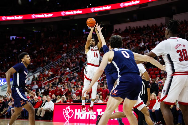 Jan 6, 2024; Raleigh, North Carolina, USA; North Carolina State Wolfpack guard Casey Morsell (14) shoots a three pointer during the first half against Virginia Cavaliers at PNC Arena. Mandatory Credit: Jaylynn Nash-USA TODAY Sports