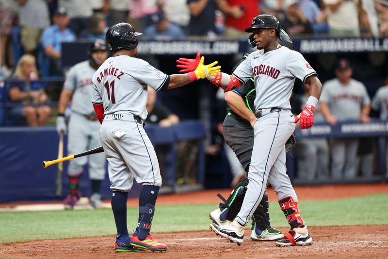 Jul 13, 2024; St. Petersburg, Florida, USA; Cleveland Guardians outfielder Angel Martinez (1) celebrates with third baseman Jose Ramírez (11) after hitting a home run against the Tampa Bay Rays in the fifth inning at Tropicana Field. Mandatory Credit: Nathan Ray Seebeck-USA TODAY Sports