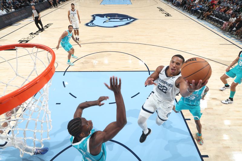 MEMPHIS, TN - OCTOBER 10: Desmond Bane #22 of the Memphis Grizzlies shoots the ball during the game against the Charlotte Hornets during a NBA Preseason game on October 10, 2024 at FedExForum in Memphis, Tennessee. NOTE TO USER: User expressly acknowledges and agrees that, by downloading and or using this photograph, User is consenting to the terms and conditions of the Getty Images License Agreement. Mandatory Copyright Notice: Copyright 2024 NBAE (Photo by Joe Murphy/NBAE via Getty Images)