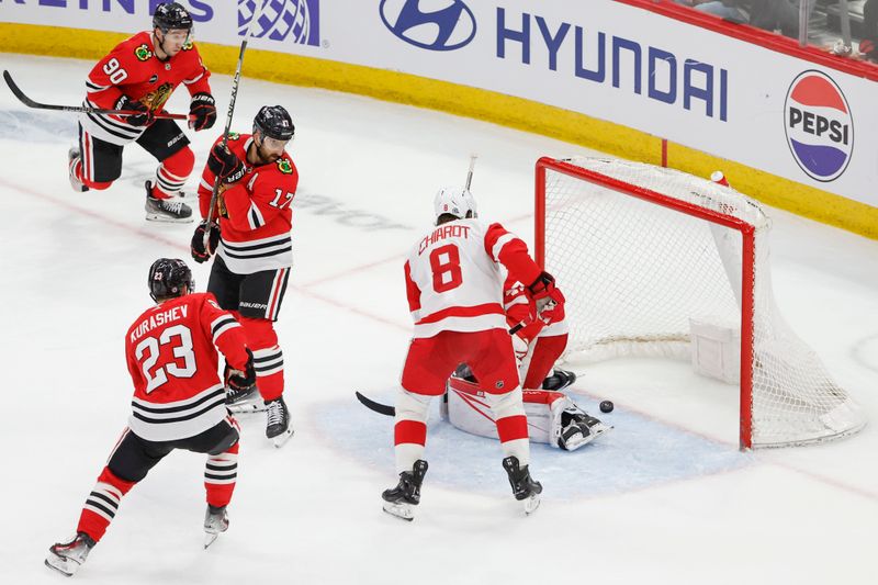 Feb 25, 2024; Chicago, Illinois, USA; Chicago Blackhawks left wing Nick Foligno (17) scores against the Detroit Red Wings during the second period at United Center. Mandatory Credit: Kamil Krzaczynski-USA TODAY Sports