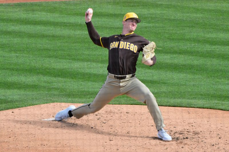 Feb 20, 2026; Peoria, Arizona, USA; San Diego Padres pitcher Justin Yeager (70) throws in the third inning against the Seattle Mariners during a Spring Training game at Peoria Sports Complex. Mandatory Credit: Matt Kartozian-Imagn Images