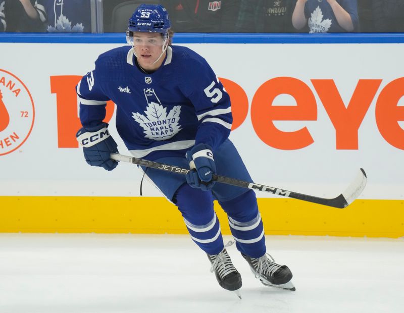 Sep 25, 2023; Toronto, Ontario, CAN; Toronto Maple Leafs forward Easton Cowan (53) skates during warm up before a game against the Ottawa Senators at Scotiabank Arena. Mandatory Credit: John E. Sokolowski-USA TODAY Sports